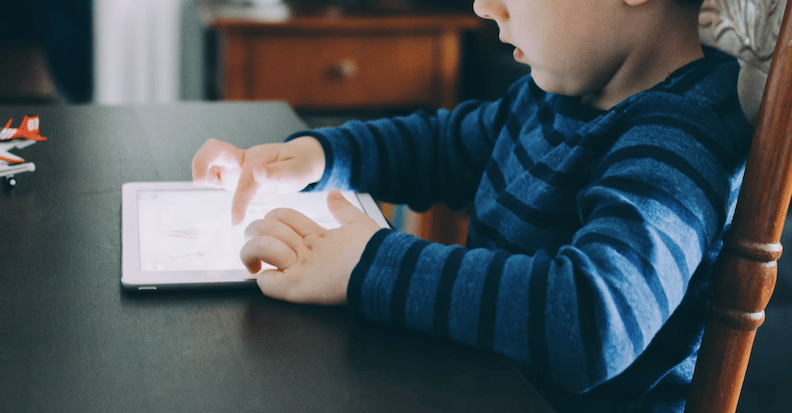 child-on-tablet